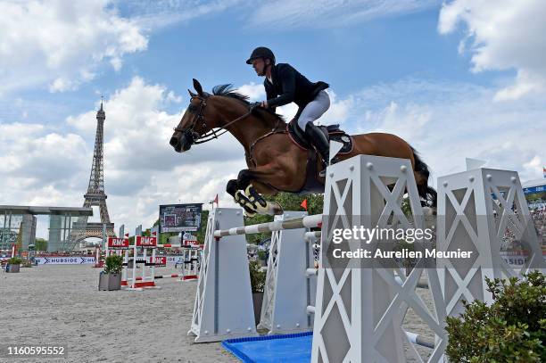 Kevin Staut of France and For Joy Van't Zorgvliet HDC compete on day three of the Longines Paris Eiffel Jumping in the Champ de Mars on July 07, 2019...