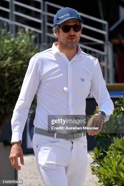 Guillaume Canet of France reacts on day three of the Longines Paris Eiffel Jumping in the Champ de Mars on July 07, 2019 in Paris, France.