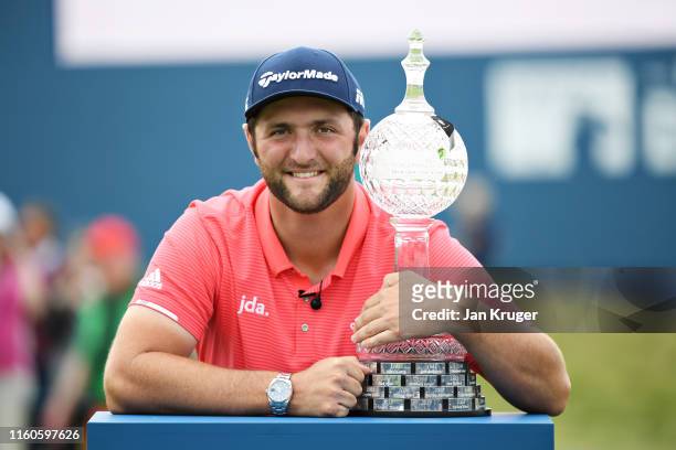 Winner Jon Rahm of Spain poses for a photo with his trophy during Day Four of the Dubai Duty Free Irish Open at Lahinch Golf Club on July 07, 2019 in...