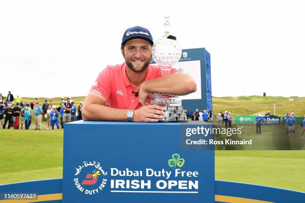 Winner Jon Rahm of Spain poses for a photo with his trophy during Day Four of the Dubai Duty Free Irish Open at Lahinch Golf Club on July 07, 2019 in...