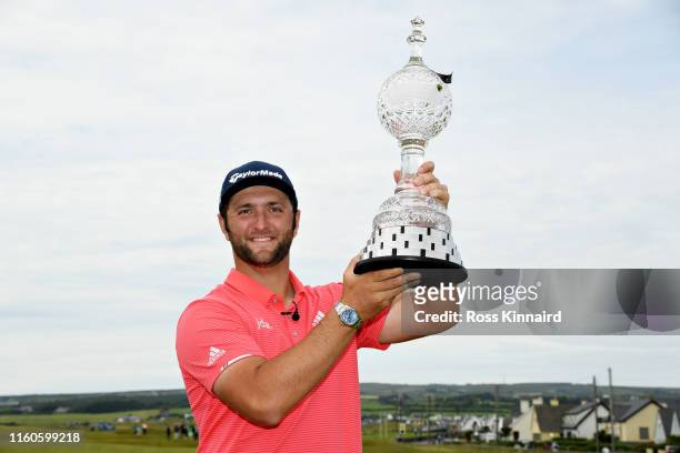 Winner Jon Rahm of Spain poses for a photo with his trophy during Day Four of the Dubai Duty Free Irish Open at Lahinch Golf Club on July 07, 2019 in...