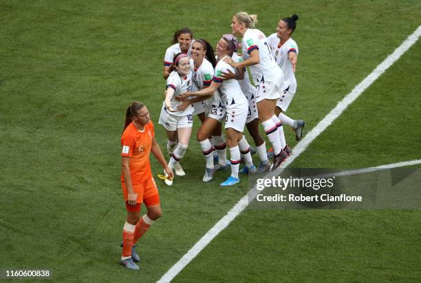 Rose Lavelle of the USA celebrates with teammates after scoring her team's second goal during the 2019 FIFA Women's World Cup France Final match...