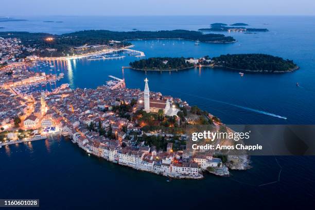 rovinj and coastline at dusk. - amos chapple stock pictures, royalty-free photos & images