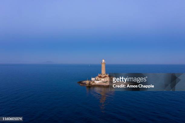 porer lighthouse on a summer day - amos chapple stock pictures, royalty-free photos & images