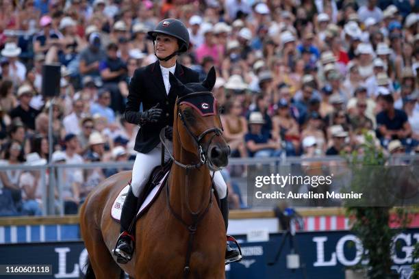 Georgina Bloomberg of The United States of America and Quibelle compete on day three of the Longines Paris Eiffel Jumping in the Champ de Mars on...