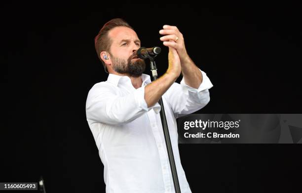 Alfie Boe performs on stage during Day 3 of the Cornbury Festival 2019 on July 07, 2019 in Oxford, England.