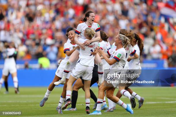 Rose Lavelle of the USA celebrates with teammates following the 2019 FIFA Women's World Cup France Final match between The United States of America...