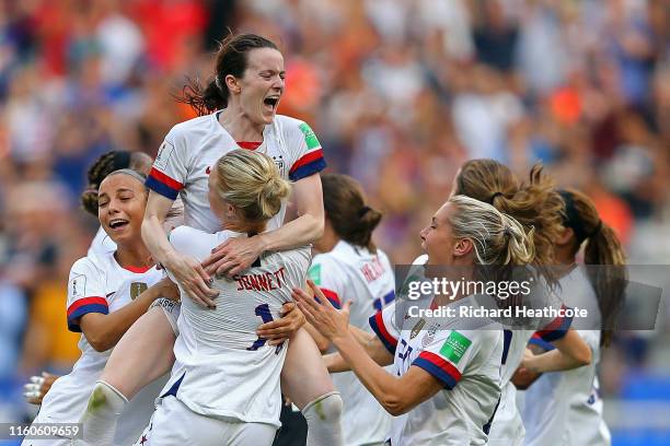 Rose Lavelle of the USA celebrates with teammates following the 2019 FIFA Women's World Cup France Final match between The United States of America...