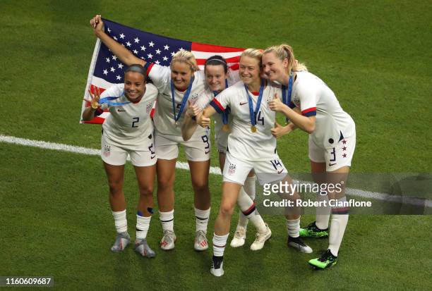 Players of the USA celebrate following the 2019 FIFA Women's World Cup France Final match between The United States of America and The Netherlands at...