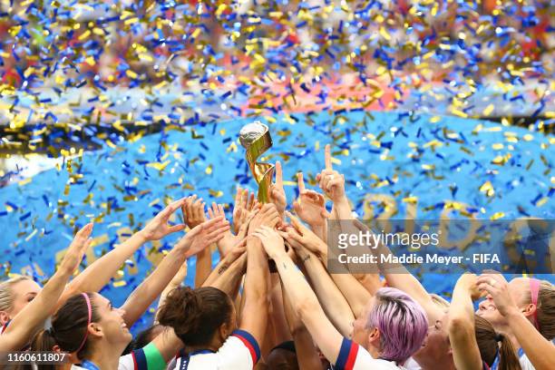 Detailed view as the USA players celebrate with the FIFA Women's World Cup Trophy following their team's victory in the 2019 FIFA Women's World Cup...