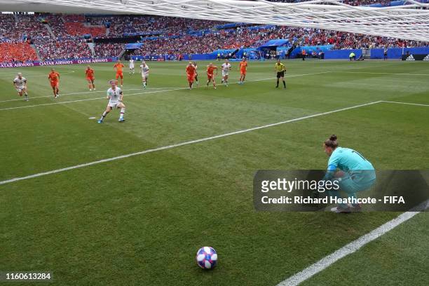 Megan Rapinoe of the USA scores her team's first goal from the penalty spot past Sari Van Veenendaal of the Netherlands during the 2019 FIFA Women's...