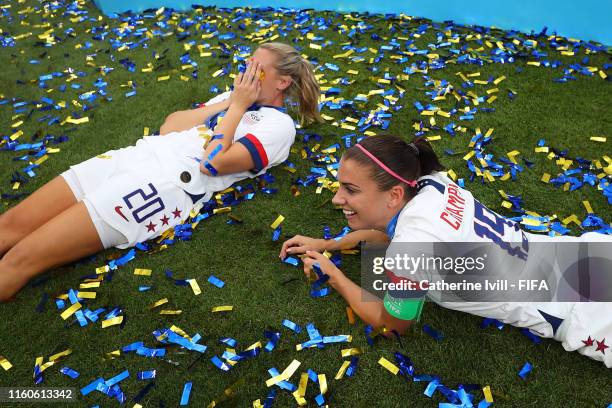 Alex Morgan and Allie Long of the USA celebrate following victory in the 2019 FIFA Women's World Cup France Final match between The United States of...