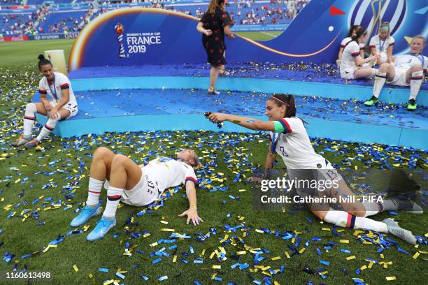 Alex Morgan and Allie Long of the USA celebrate following victory in the 2019 FIFA Women's World Cup France Final match between The United States of...