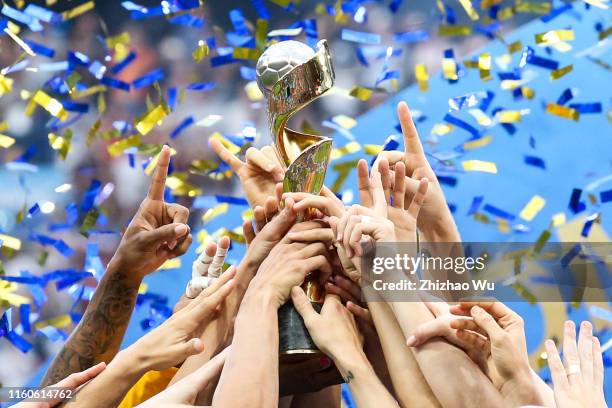Carli Lloyd of USA rise up the trophy during award ceremony of the 2019 FIFA Women's World Cup France Final match between The United State of America...