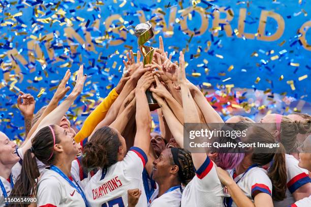 Team USA celebrates with the FIFA Womens world cup trophy at full time of the 2019 FIFA Women's World Cup France Final match between Winner The...