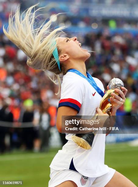 Julie Ertz of the USA celebrates with the FIFA Women's World Cup Trophy following her team's victory in the 2019 FIFA Women's World Cup France Final...