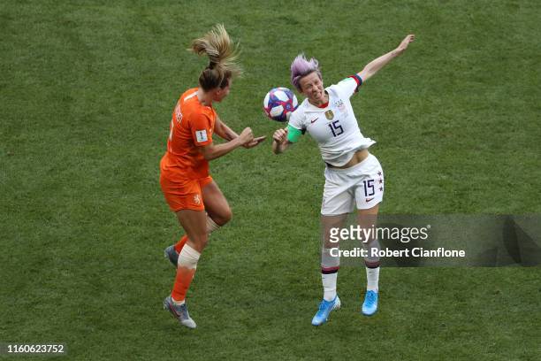 Desiree Van Lunteren of the Netherlands battles for possession with Megan Rapinoe of the USA during the 2019 FIFA Women's World Cup France Final...