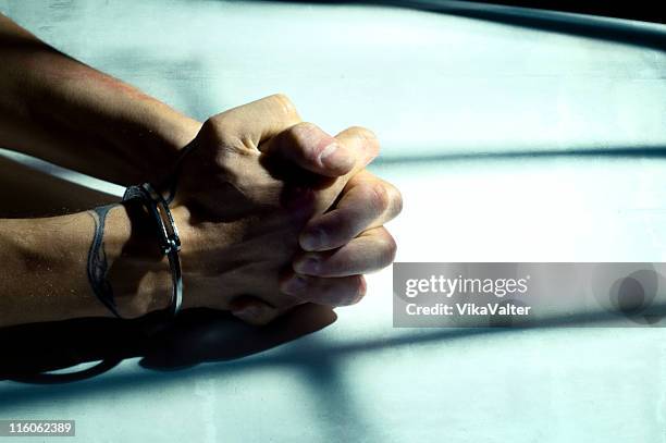 cuffed - fuzzy handcuffs stock pictures, royalty-free photos & images