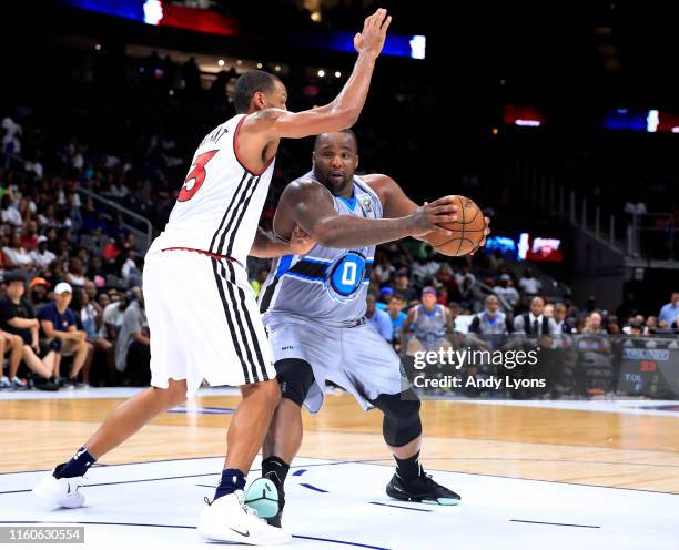 Glen Davis of Power plays against Patrick O’Bryant of Trilogy during week three of the BIG3 three on three basketball league at State Farm Arena on...