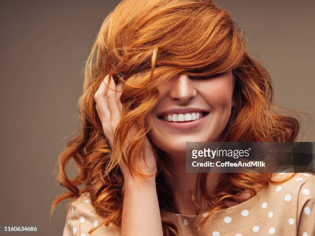 tender girl with fluffy red hair - wavy hair stock pictures, royalty-free photos & images