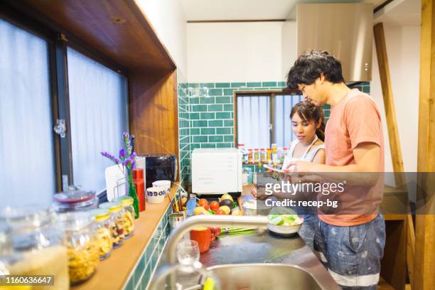 Couple preparing vegetarian food