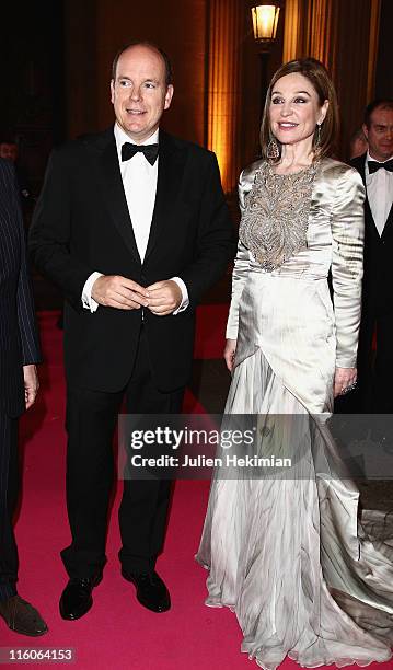 Prince Albert II of Monaco and Becca Cason Thrash attend the 'Liaisons Au Louvre II' Charity Gala Dinner at Musee du Louvre on June 14, 2011 in...
