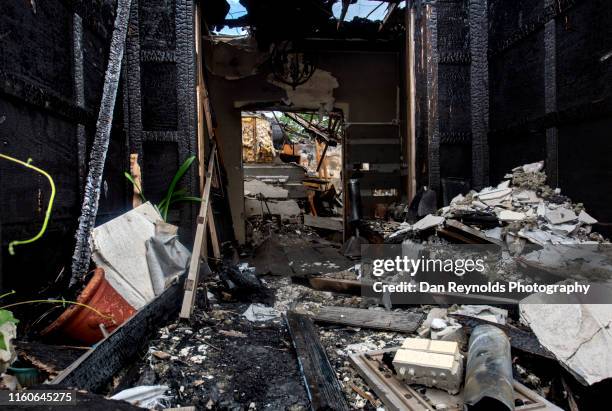 fire destruction burned building insurance - damaged building stock pictures, royalty-free photos & images