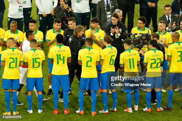 Ricardo Gareca head coach of Peru is applauded by players of Brazil after the Copa America Brazil 2019 Final match between Brazil and Peru at...
