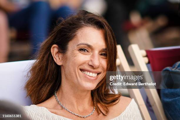 Aure Atika attends "A Sunday at the Cinema" with the projection of the film "OSS 117 Le Caire" At the Champs Elysees on July 07, 2019 in Paris,...