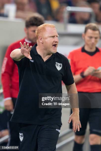 Head coach Heiko Vogel of KFC Uerdingen gestures during the DFB Cup first round match between KFC Uerdingen and Borussia Dortmund at Merkur Spiel...