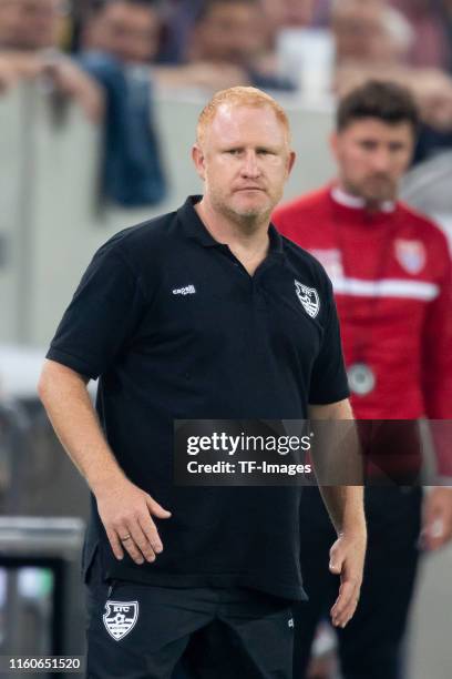 Head coach Heiko Vogel of KFC Uerdingen gestures during the DFB Cup first round match between KFC Uerdingen and Borussia Dortmund at Merkur Spiel...