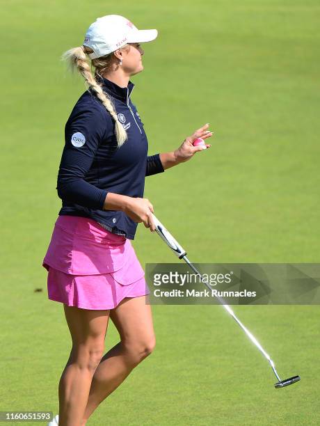 Carly Booth of Scotland putting at the 1st green during the Aberdeen Standard Investment Scottish Open at The Renaissance Club on August 10, 2019 in...