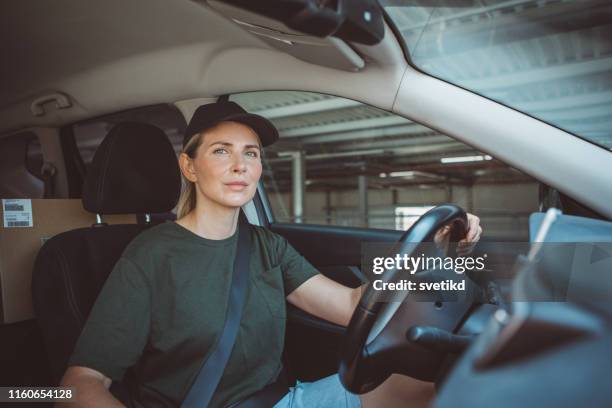 looking for location of next customer - female driving stock pictures, royalty-free photos & images