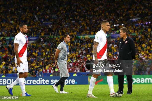 Paolo Guerrero of Peru holds the second place trophy after the Copa America Brazil 2019 Final match between Brazil and Peru at Maracana Stadium on...