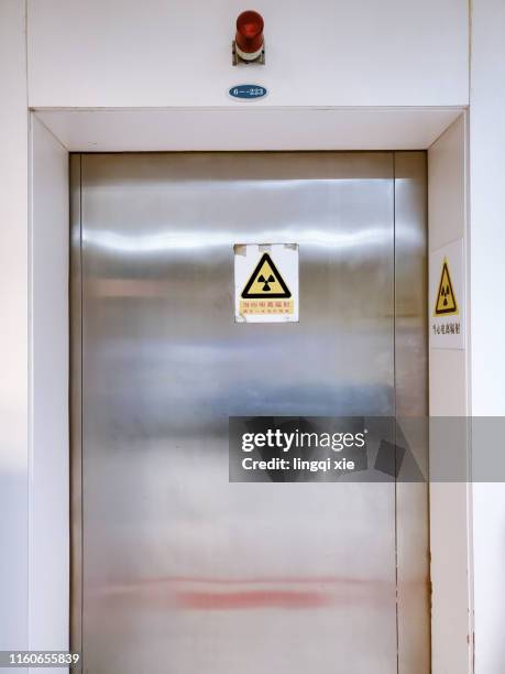 hospital radiation treatment room gate - metal catwalk stock pictures, royalty-free photos & images