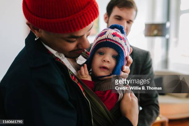 close-up of baby with father - eltern deutschland normal stock-fotos und bilder