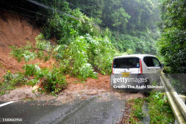 Car is washed by a landslide on July 3, 2019 in Soo, Kagoshima, Japan. On July 3, downpours continued to lash Kagoshima, Miyazaki and Kumamoto...