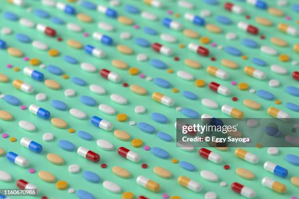 tablets and a capsules - antibiotic pills stock pictures, royalty-free photos & images