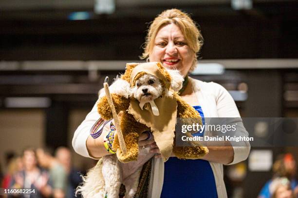 Monica Corona, whose dog Nelda appears in cosplay as an Ewok from Star Wars at Comic-Con Museum on July 07, 2019 in San Diego, California.