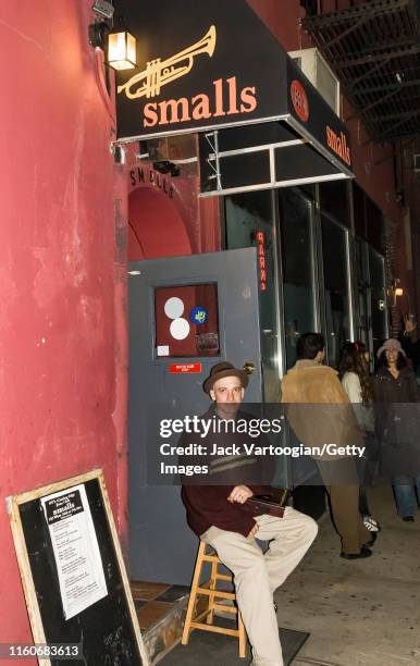 Portrait of American impresario and manager Mitch Borden outside the door to his nightclub, Smalls Jazz Club , in the Greenwich Village neighborhood,...