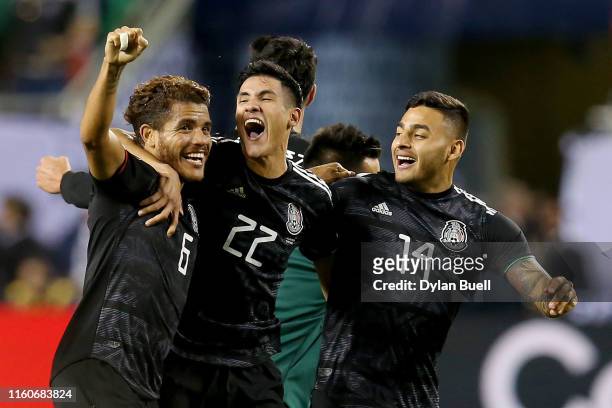 Jonathan dos Santos, Uriel Antuna, and Alexis Vega of the Mexico celebrate after beating the United States 1-0 in the 2019 CONCACAF Gold Cup Final at...