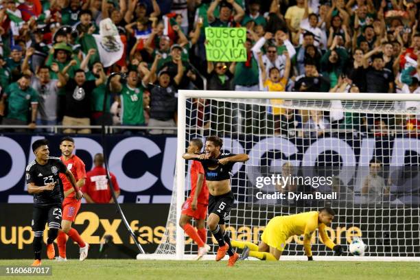 Jonathan dos Santos of the Mexico celebrates after scoring a goal in the second half during the 2019 CONCACAF Gold Cup Final at Soldier Field on July...