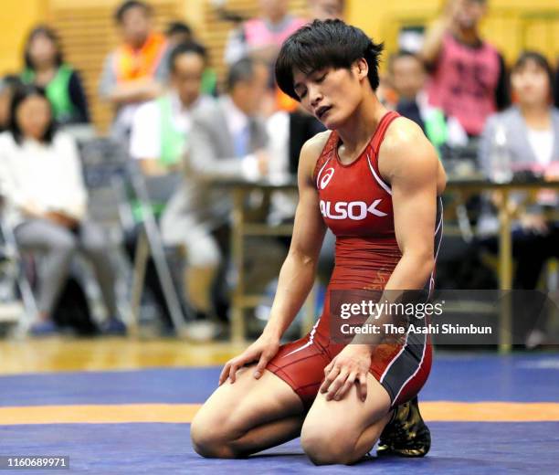 Kaori Icho reacts after her defeat by Risako Kawai in the Women's 57kg play-off match during the Wrestling World Championships Japan Play-offs at...