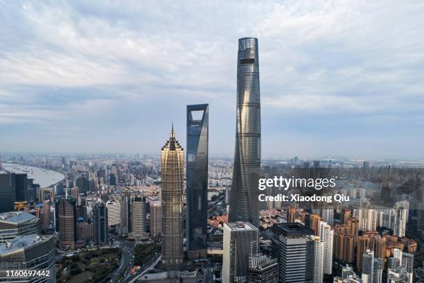 shanghai at dusk - jin mao tower stock pictures, royalty-free photos & images