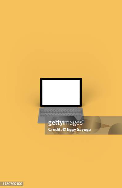 tablet with keyboard cover on yellow background 2 - desktop computer icon stock-fotos und bilder