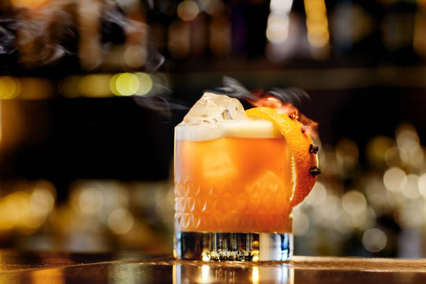 whisky sour - orange cocktail stock pictures, royalty-free photos & images