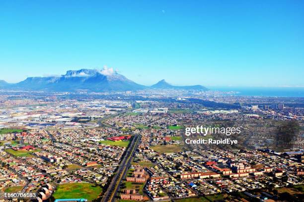 aerial view of cape town's table mountain and suburbs - housing development south africa stock pictures, royalty-free photos & images