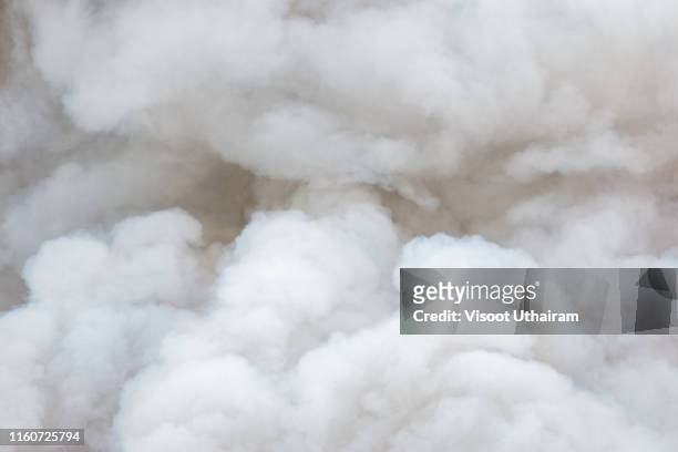 bomb smoke background,smoke caused by explosions,white smoke like clouds background. - terrorism illustration stock pictures, royalty-free photos & images