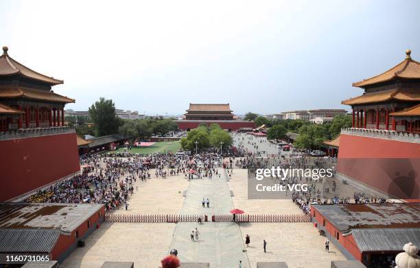 Tourists visit the Forbidden City on July 7, 2019 in Beijing, China.