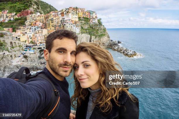 selfies in cinque terre - liguria stock pictures, royalty-free photos & images